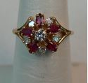 Picture of 14K YELLOW GOLD ING WITH DIAMONDS AND RED STONES SZ-6 3.2G 