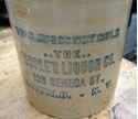 Picture of VINTAGE STONE WEAR VINTAGE  JUG. "THIS JUG IS NOT SOLD..THE.. THE PEOPLE'S LIQUOR CO. 126 SENECA ST BUFFALO.- N.Y COLLECTIBLE". GOOD CONDITION. 