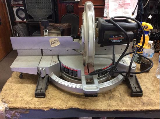 Picture of Delta sidekick 12” compound miter saw used tested in a good working order . 