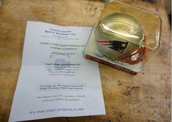 Picture of TOM BRADY SIGNED NEW ENGLAND PATRIOTS MINI RIDDELL HELMET WITH COA MINT CONDITION. COLLECTIBLE.