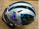 Picture of CAROLINA PANTHERS MULTI AUTO MINI HELMET BY 4 NEWTON KUECHLEY RIDDELL WITH COA; PLASTIC CASE. MINT CONDITION. COLLECTIBLE