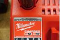 Picture of Milwaukee 2407-20 3/8" 12V Drill/Driver With 2 Batteries 48-11-2401 And Charger 48-59-1812. used. tested. in a good working order. very good condition.