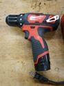 Picture of Milwaukee 2407-20 3/8" 12V Drill/Driver With 2 Batteries 48-11-2401 And Charger 48-59-1812. used. tested. in a good working order. very good condition.