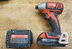 Picture of MILWAUKEE 18V 2656-20 1/4 IMPACT DRIVER WITH 2 BATTERIES 18V 1.5 AH USED. TESTED. IN A GOOD WORKING ORDER.