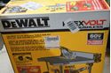 Picture of Dewalt  DCS7485T1-EB 60v table saw kit with 24" rip capacity NEW IN BOX. OPEN BOX. BOX WAS OPEN FOR INSPECTION. WITH 2 BATTERIES AND CHARGER.