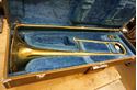 Picture of Vintage Yamaha Trombone YSL-352 with mouthpiece , case.  PLEASE READ CAREFULLY. BEING SOLD AS IS. AS FIXER UPPER.  INSTRUMENT HAS DENTS. 