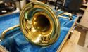 Picture of Vintage Yamaha Trombone YSL-352 with mouthpiece , case.  PLEASE READ CAREFULLY. BEING SOLD AS IS. AS FIXER UPPER.  INSTRUMENT HAS DENTS. 