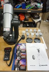 Picture of MEADE ETX 60 BACKPACK OBSERVATORY TELESCOPE WITH EXTRAS . NO TRIPOD. USED. TESTED. IN A GOOD WORKING ORDER. MINT CONDITION. WITH EXTRAS -MANUAL; BACKPACK; REMOTE; 3 DVDS; 5 LENSES MEADE MA 12MM; MEADE MA 4MM; MEADE MA 4MM; MEADE MA 25MM; MEADE MA 12MM. PLEASE LOOK AT ALL THE PICTURES .