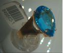 Picture of 14kt yellow gold fashion ring with pear shape light blue topaz stone total weight 5.8 gr . Pre owned . Size 8.25 