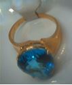 Picture of 14kt yellow gold fashion ring with pear shape light blue topaz stone total weight 5.8 gr . Pre owned . Size 8.25 