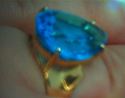 Picture of 14kt yellow gold fashion ring with pear shape light blue topaz stone total weight 5.8 gr . Pre owned . Size 8.25 