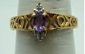 Picture of 10kt yellow gold ring with oval amethyst and 2 small round diamonds . Size 7 . Pre owned. very good. Total weight 2.2  . 824461-4.