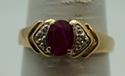 Picture of 10kt yellow gold ring with red stone size 7.25 total weight 2.0 gr . Pre owned.  840097-1.