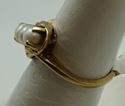 Picture of 10kt yellow gold fashion ring with pearls size 6 pre owned .3 pearls X 4.5 mm. Total weight 2.8 gr . 845765-1. 