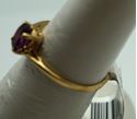 Picture of 10kt yellow gold ring with red margie stone size 8.25 2.0gr very good condition . pre owned. 852046-1. 