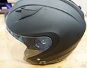 Picture of HARLEY DAVIDSON MOTORCYCLE HELMET BLACK W LIFT FACE SHIELD; SUN PROTECTION.SMALL. PRE OWNED. VERY GOOD CONDITION. 