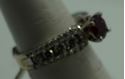 Picture of 14kt white gold ring with diamonds and red stone size 6.75