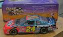 Picture of 1/24 JEFF GORDON #24 DUPONT HALF CLEAR CAR 2001 ACTION NASCAR . NEW . IN BOX.