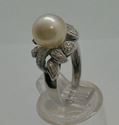 Picture of 18KT WHITE GOLD RING WITH 9MM PEARL AND 0.25 CARAT DIAMONDS (28 ROUND);  5.3 GR; SIZE 7 VERY GOOD CONDITION. PRE OWNED.  852076-2.