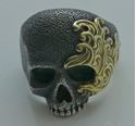 Picture of DAVID YURMAN LARGE SKULL STERLING SILVER RING WITH 18KT WAVES DESIGN SIZE 10.  31.2 GRAMS. PRE OWNED. VERY GOOD CONDITION. 852263-1. 