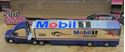 Picture of 1:64 MOBIL ONE RACING TRUCK & SMALL FORD TAURUS CAR COLLECTIBLE NEW. IN BOX.