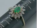 Picture of 14KT YELLOW GOLD FASHION RING SIZE 6.5 2.8 GRAMS WITH EMERALD OVAL STONE AND 12 ROUND DIAMONDS.  PRE OWNED. VERY GOOD CONDITION. 851806-1.