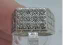 Picture of 14kt white gold men's ring with 12 diamonds (1 carat ); 11.6 grams; size 8. pre owned. very good condition. 847306-1.