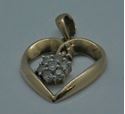 Picture of 10kt yellow gold heart pendant with 7 small round diamonds 2.1 grams 843375-2