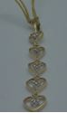 Picture of 14kt yellow gold drop down pendant with 5 diamonds 1 grams 826705-3