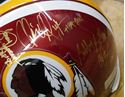 Picture of WASHINGTON REDSKINS SIGNED TEAM REPLICA NFL HELMET WITH COA COLLECTIBLE.  VERY GOOD CONDITION. 